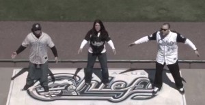 Danny Velez, Nikki Feroni and Dan Ignacio perform "Chiefsville" at NBT Bank Stadium.