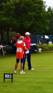 Waiting for the first shot on the first tee Sunday are Fred Funk and his caddy, wife Sharon.