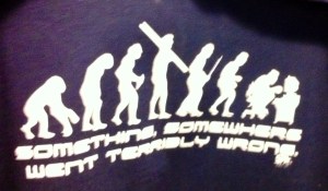 T-shirt with caveman going to computer man