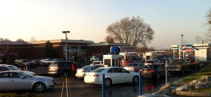 A little warmth and sun brings out the long car wash line in Syracuse, N.Y.