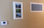 New thermostat, left. New grate, right. Photos from Hawaii, center. Nice wall.