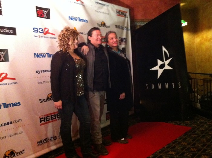Members of Syracuse band The Gunrunners pose on the Sammys red carpet Friday, March 7.