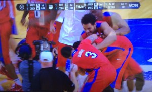 Dayton celebrates its one-point victory over Ohio State just now. (From my flat screen)