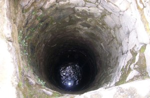 Thought I was getting into a pool and fell into the bottom of a well instead. (Photo pubic domain)