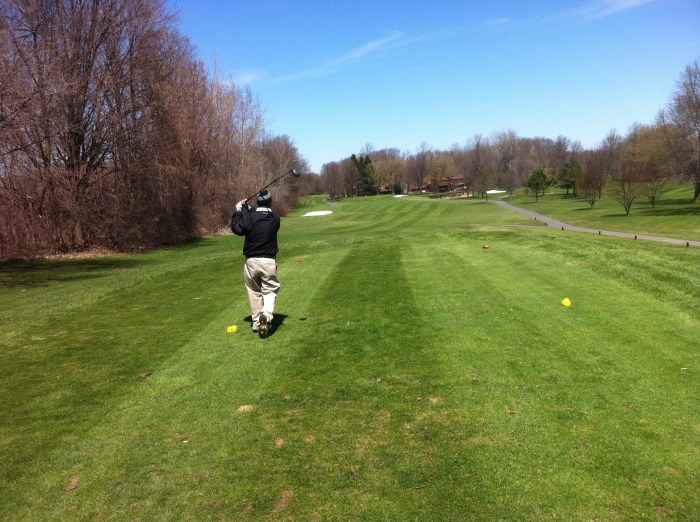 Wags hits his drive on the 10th. Down the center, two feet from Kingpin's shot.