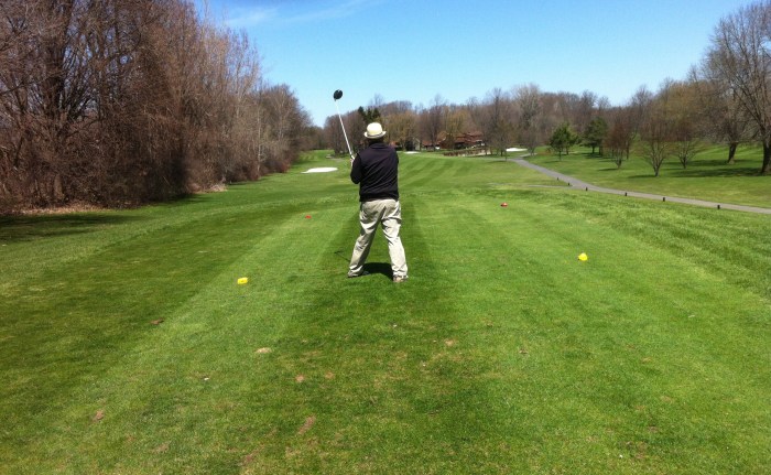 I hit my drive on the 10th. Notice the lack of balance as the shot flares 25 yards shorter and into the right rough.