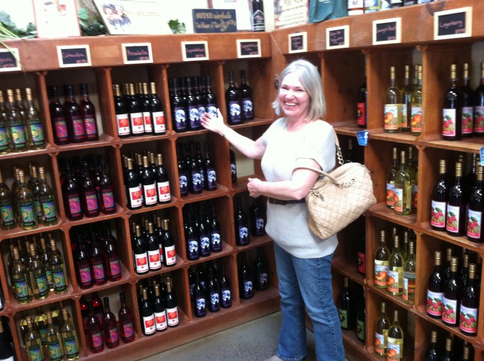 My dear wife Karen points out a label she likes at Knapp Winery and Vineyard's store.