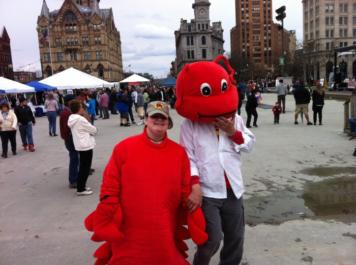 The Crawfish and Norm share a moment.