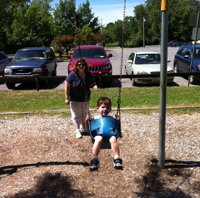 Evan gets a push from mom Julie.