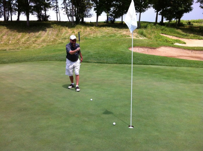 I pushed my first shot on hole one, four feet to the right of the pin.