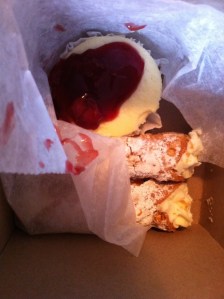 One mini cherry cheesecake, two cannoli.