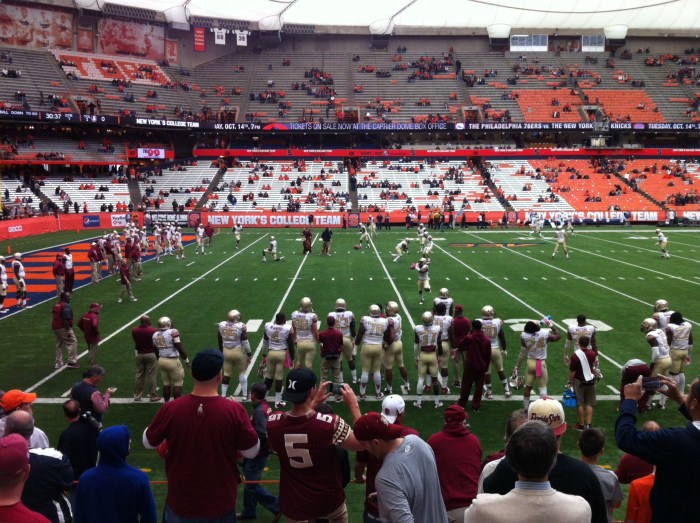The No. 1 team in the nation warms up, and their fans press as close as possible to take pictures.