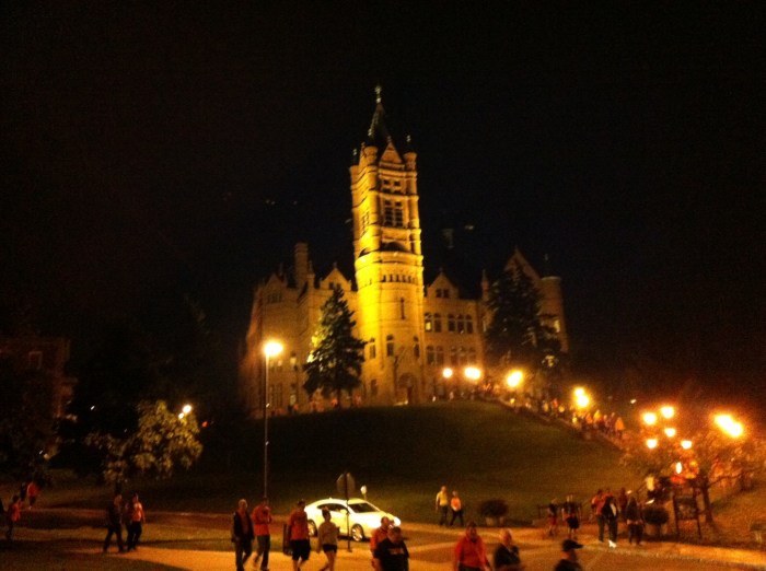 A somber mood as the rain started and the crowd filed down the hill Friday night on the Syracuse University campus.