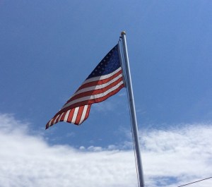 Our flag, as flown on his front lawn every holiday in Syracuse, N.Y., by Good Neighbor Tim.