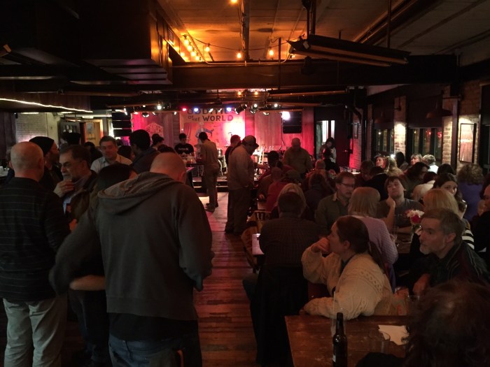 A warm room ready for food, drink and music.