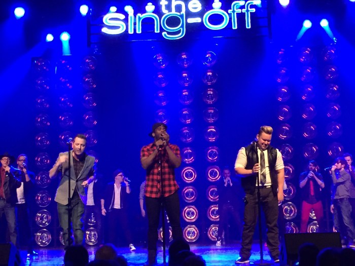 A special moment puts the three lead singers at the microphone during the opening night of  The Sing-Off live tour for 2015 at the  Turning Stone Resort and Casino Showroom.