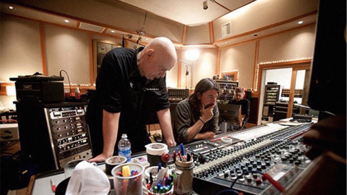 Chris Goss, left, masters the reality of studio work in LA. (From syracuseareamusic.com)