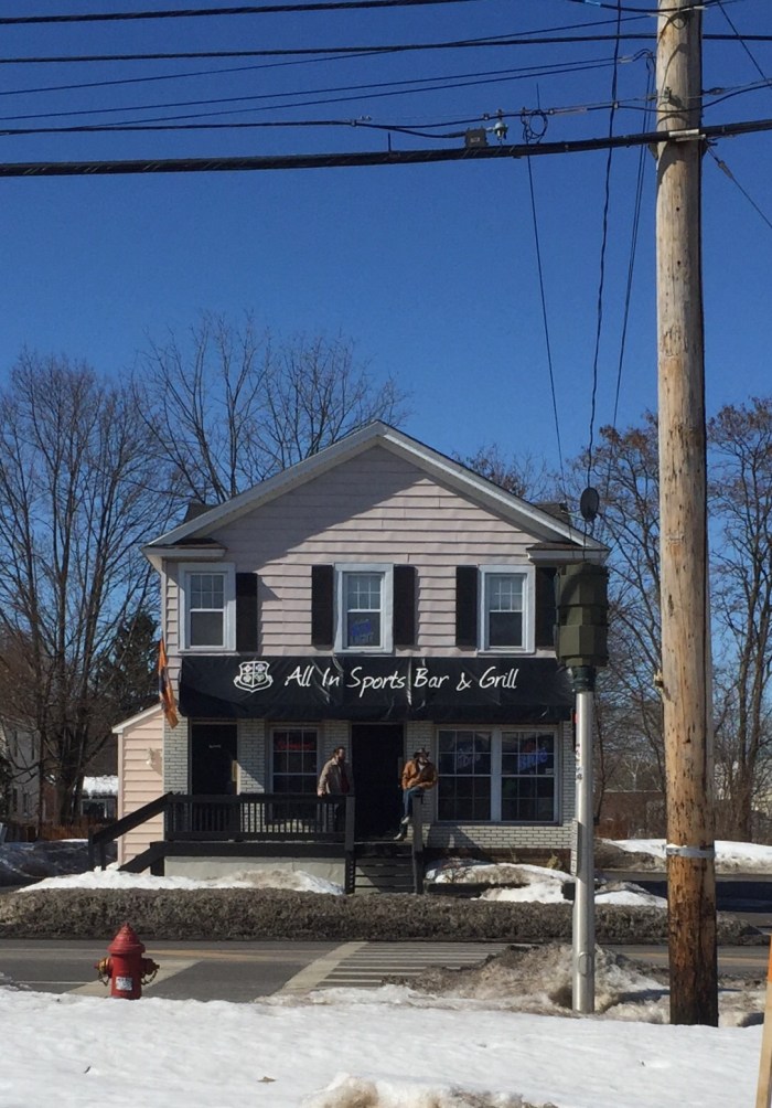 Hanging out, at the corner bar.