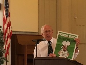 Neal Bandlow shares an important point as professor emeritus at the spring 2015 SUNY Morrisville journalism convocation program.