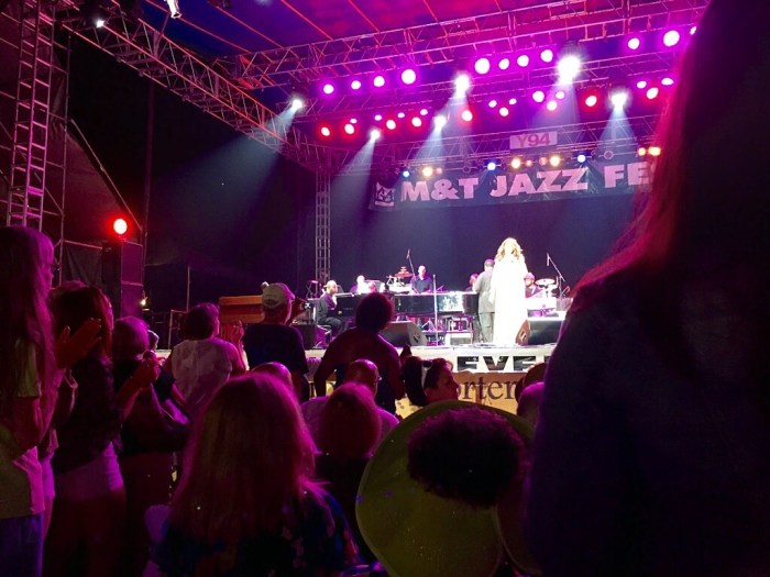 The crowd reacts to Aretha.