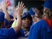 High fives for the new Met Cespedes.  (Photo from Getty Images)