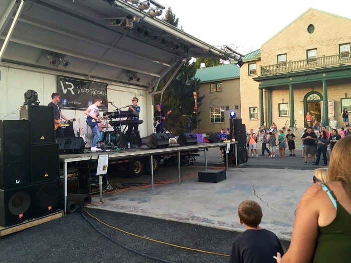 The young band at a small stage.