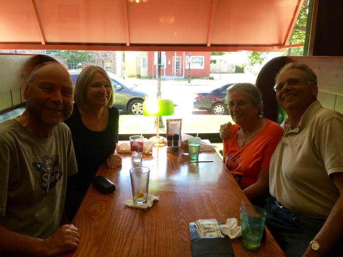 The four of us. Thanks, waitress.