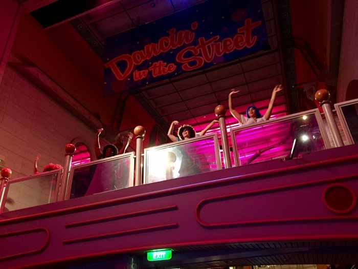 In costume, ship workers.