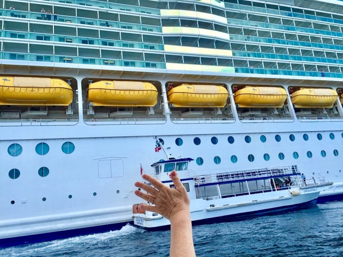 Karen gives an impromptu wave of jubilation toward our ship.